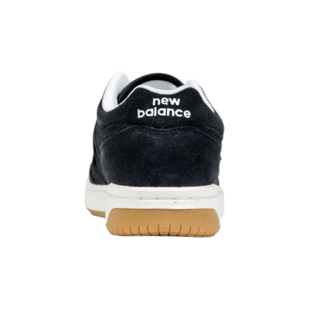 New Balance Black And White Leather Athletic Sneakers