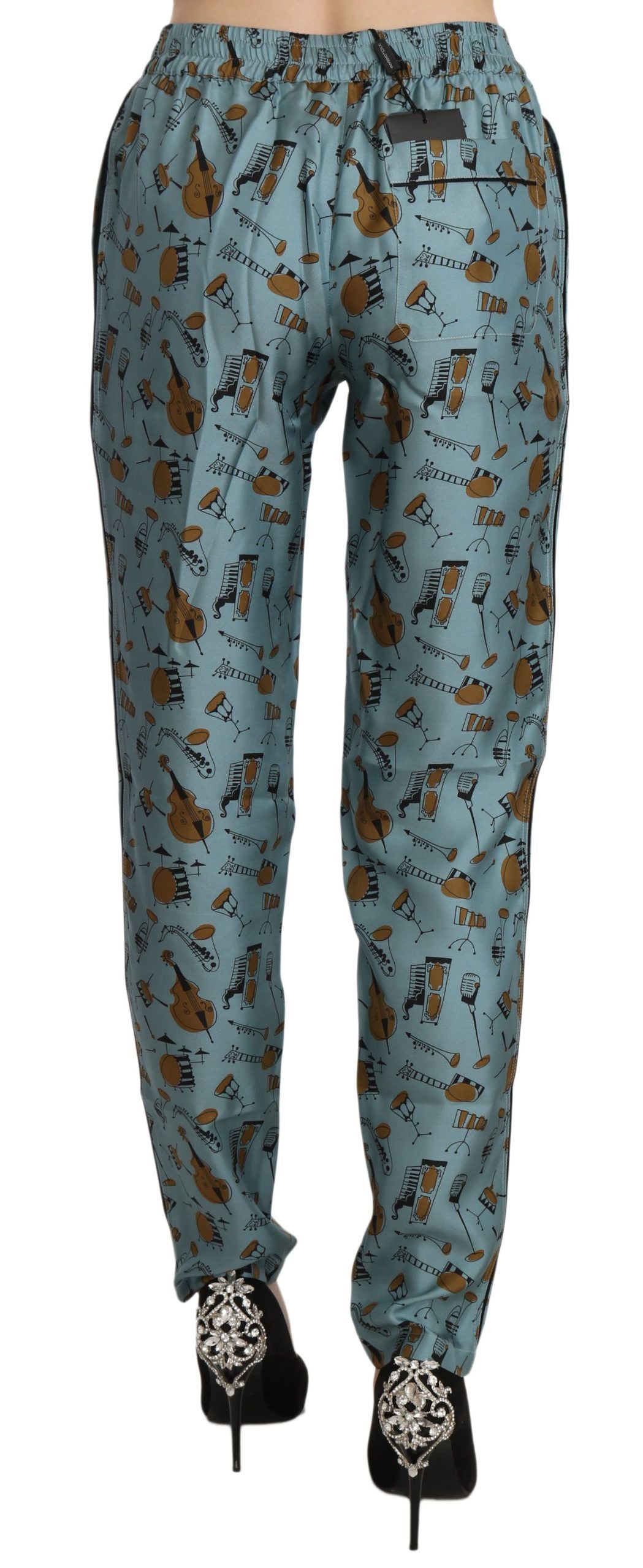 Pantaloni affusolati a vita alta in seta con stampa blu