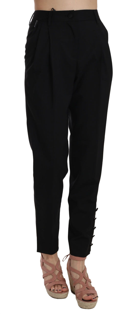 Eleganti pantaloni neri affusolati a pieghe