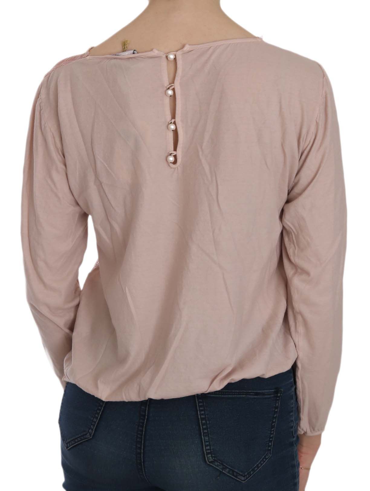 Elegante camicetta con scollo a barca in pizzo rosa