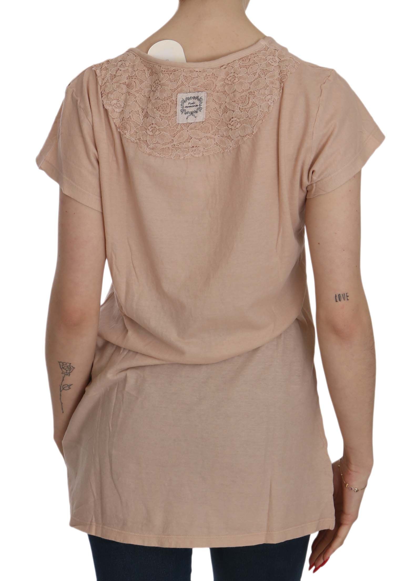 Elegante camicetta in pizzo color crema con scollo rotondo