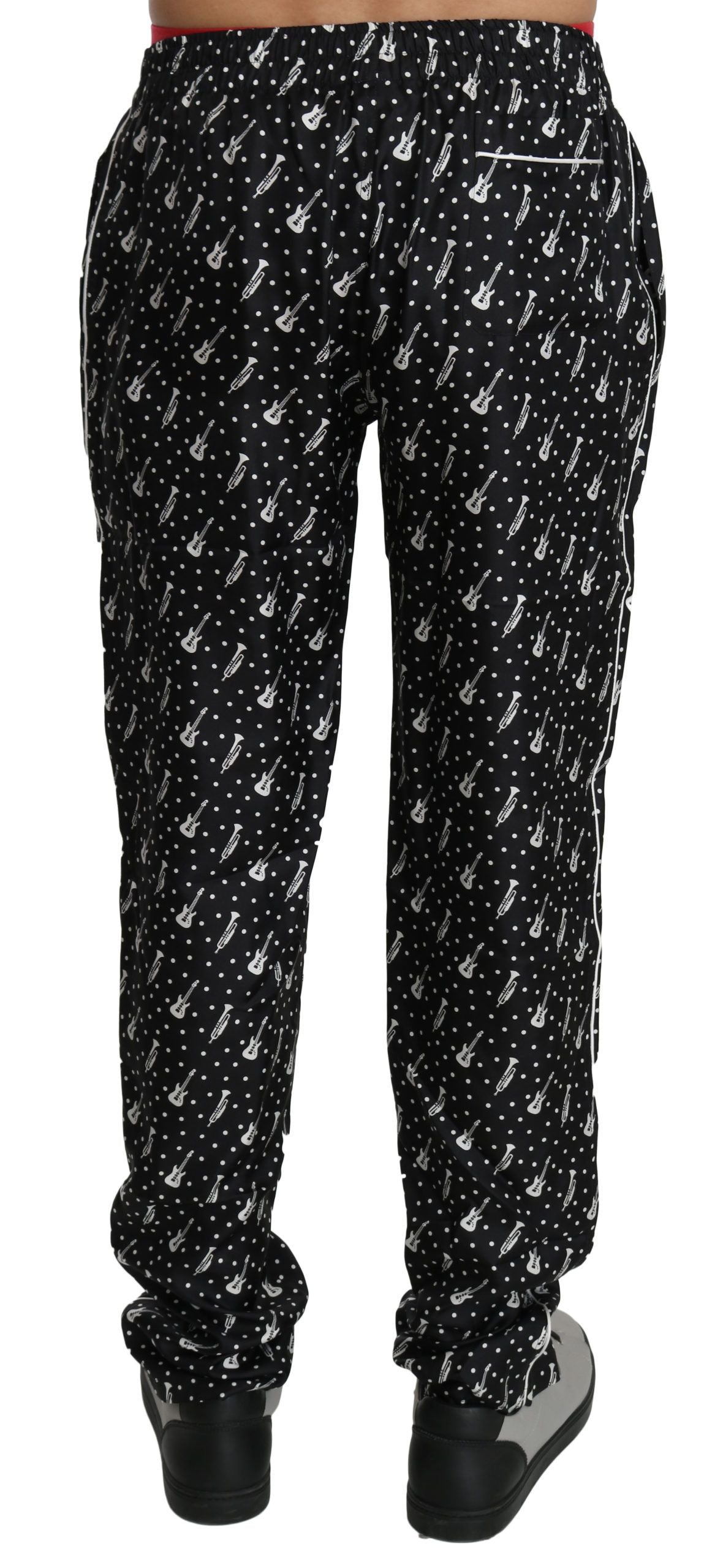 Elegante schwarze Seidenhose mit Musikinstrumenten-Print