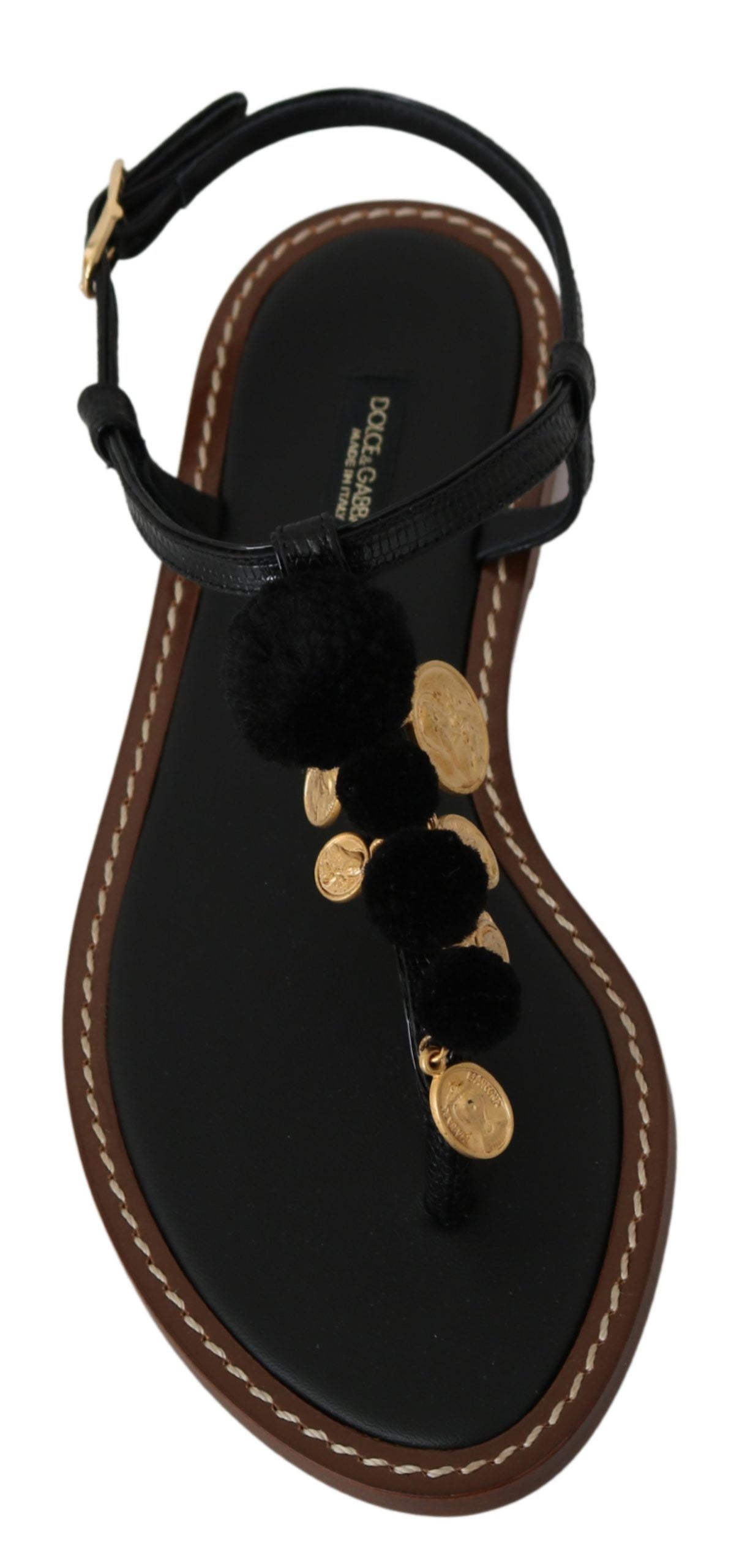 Flip-Flops mit Knöchelriemen und Pom-Pom-Muster
