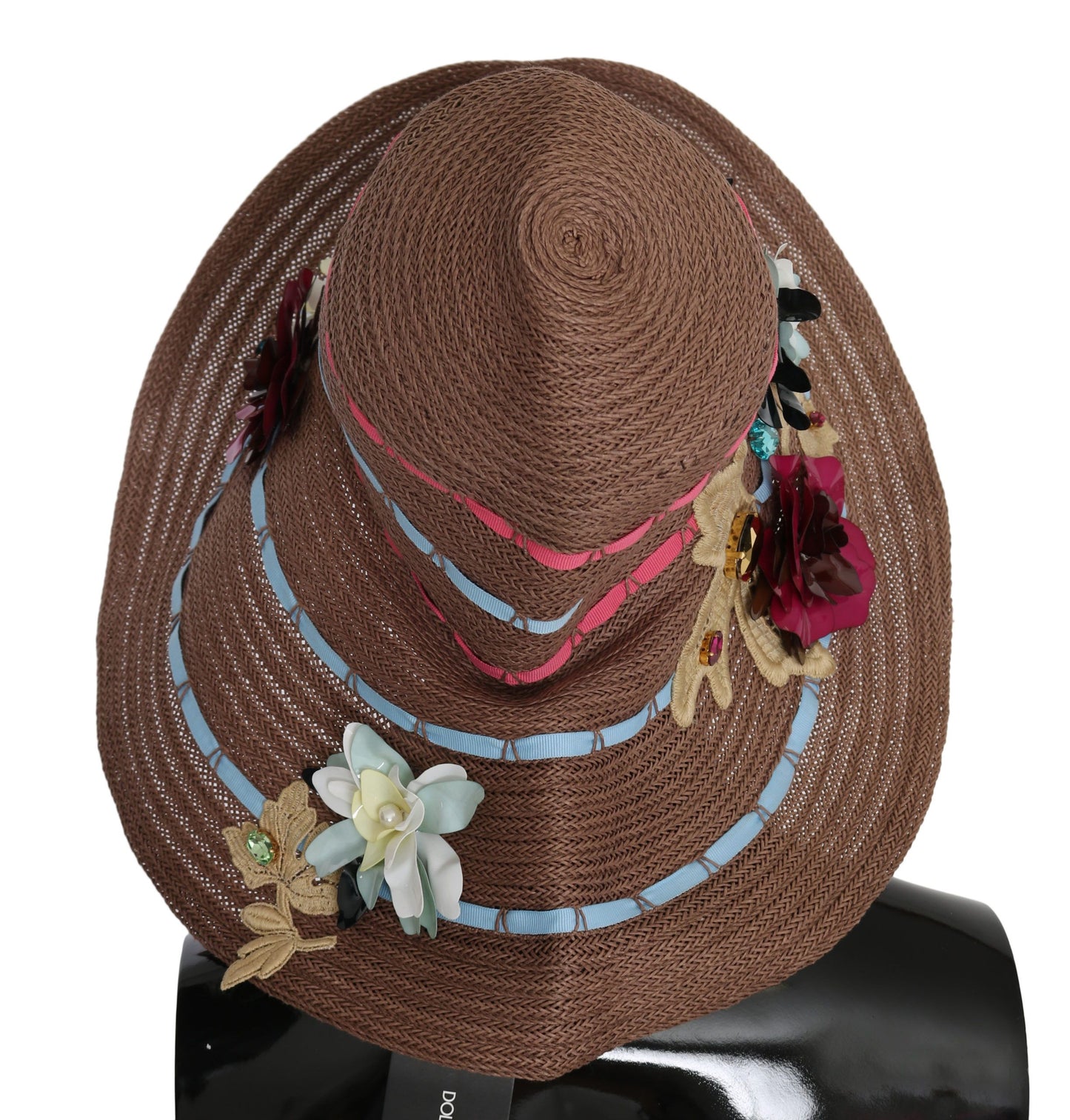 Elegante cappello di paglia floscio con accenti floreali