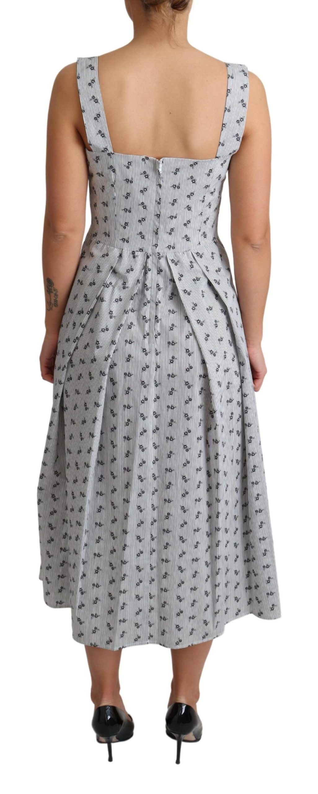 Elegante abito a trapezio con motivo floreale a righe