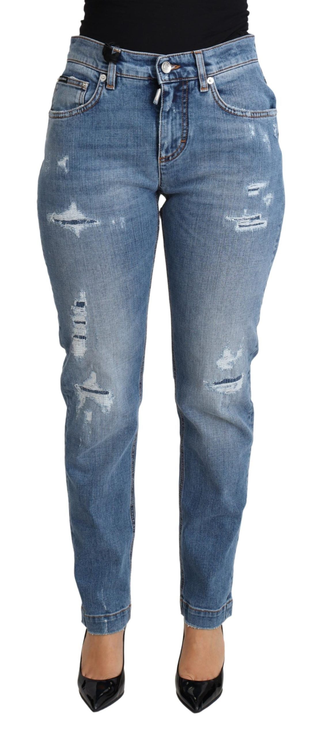 Jeans skinny strappati a vita alta chic