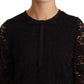Elegante top a maniche lunghe in pizzo floreale nero