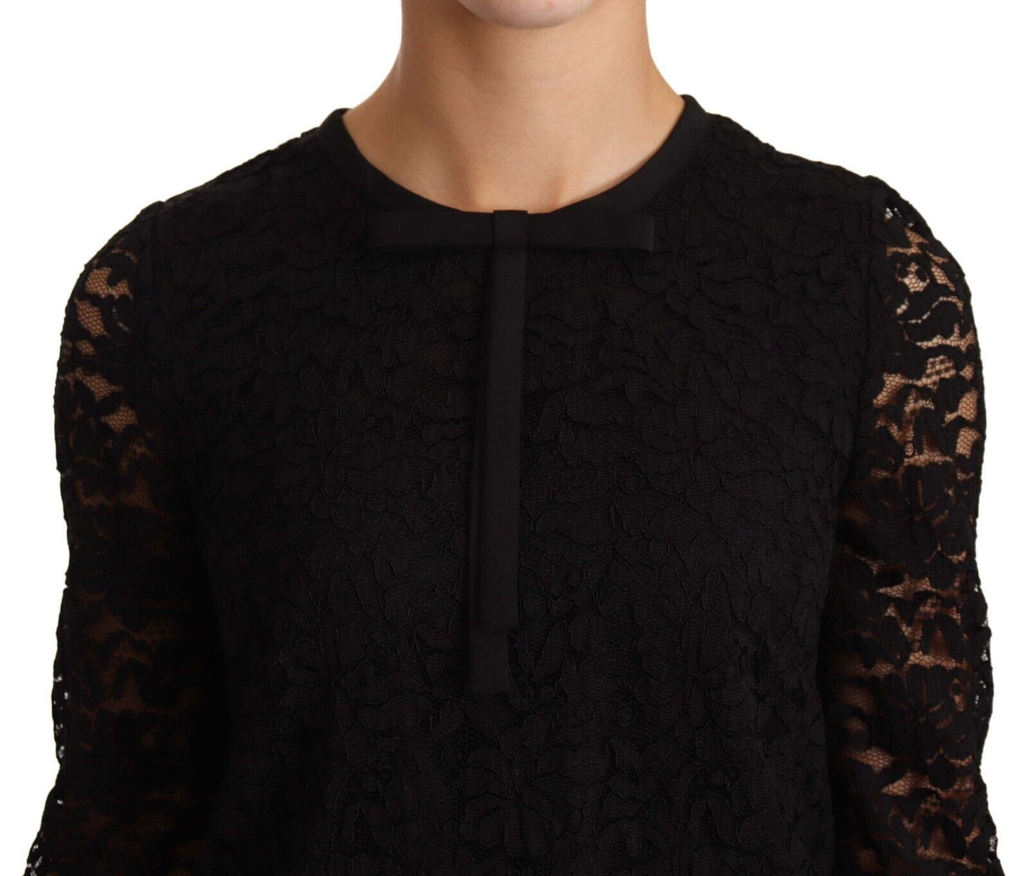 Elegante top a maniche lunghe in pizzo floreale nero
