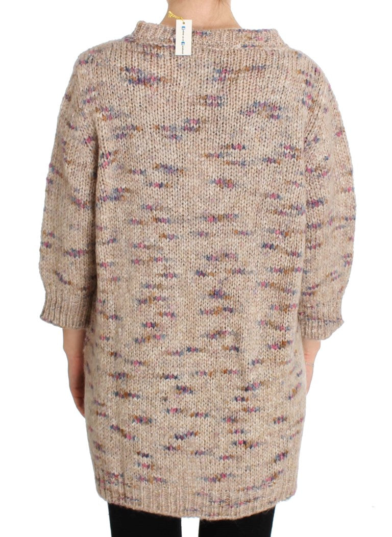 Maglione lavorato a maglia beige oversize con scollo a V