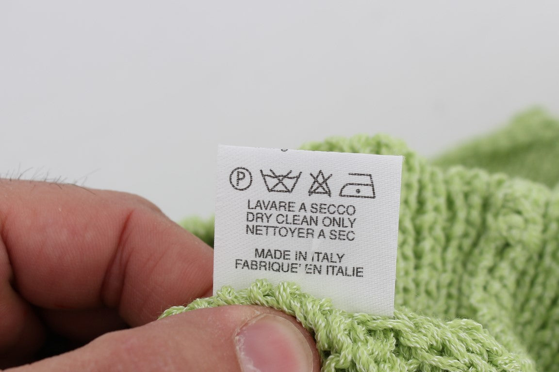 Elegante maglione verde lavorato a maglia senza maniche