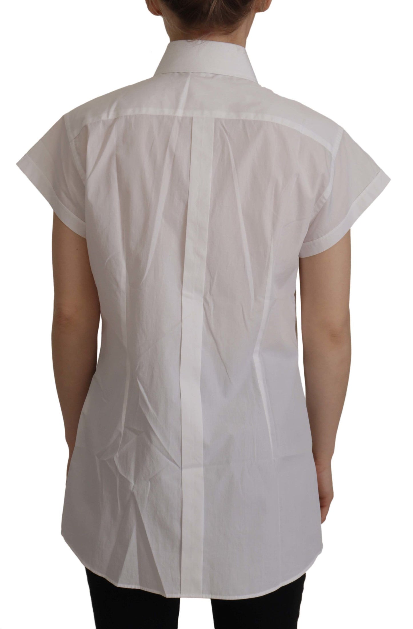 Elegante ärmellose Smokingbluse mit Kristallknöpfen