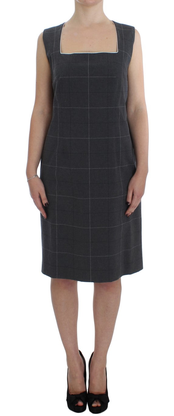 Elegante completo da uomo a tubino a quadri grigi