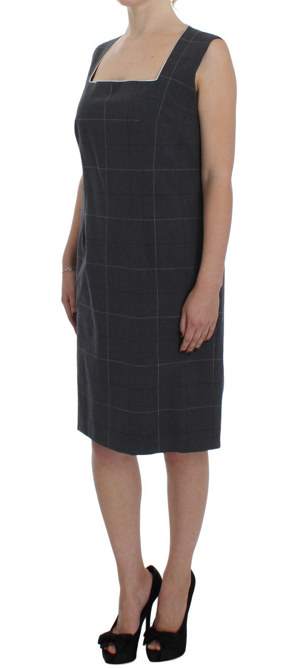Elegante completo da uomo a tubino a quadri grigi