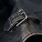 Elegante giacca in pelle nera con dettagli in argento