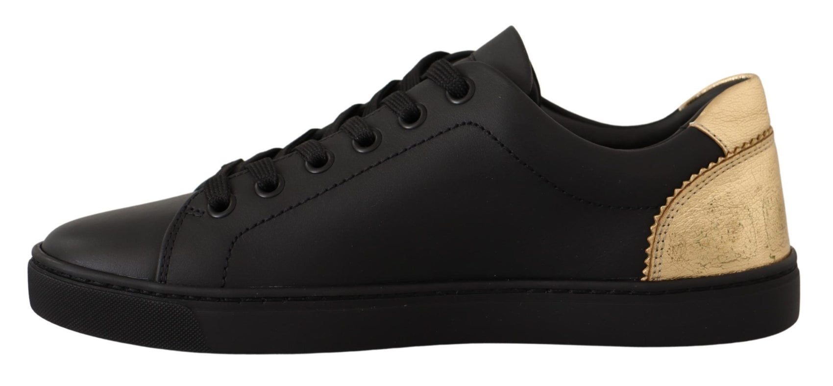 Schicke schwarze und goldene Low-Top-Sneakers aus Leder
