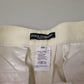 Eleganti pantaloni in lana a vita alta color avorio