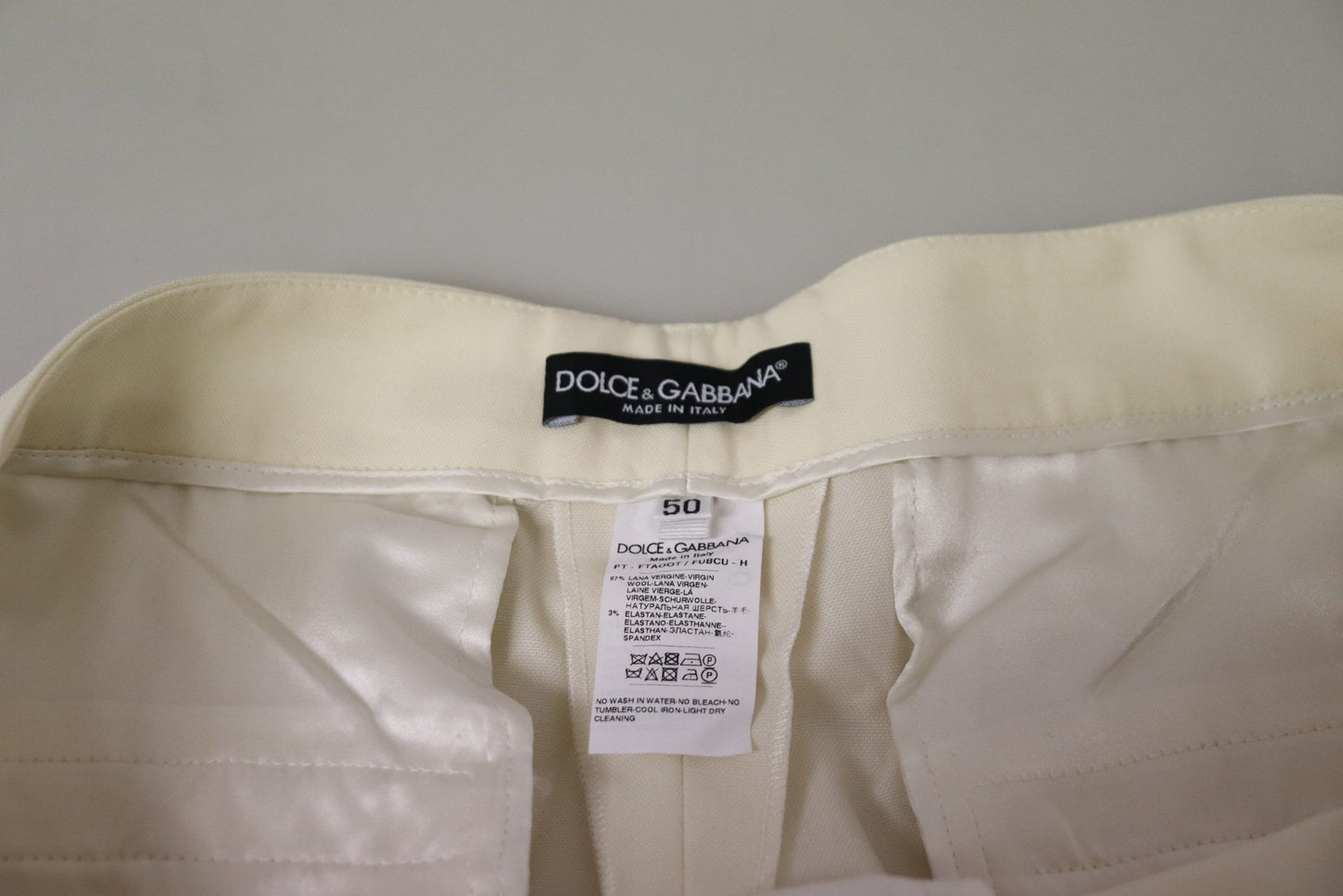 Eleganti pantaloni in lana a vita alta color avorio