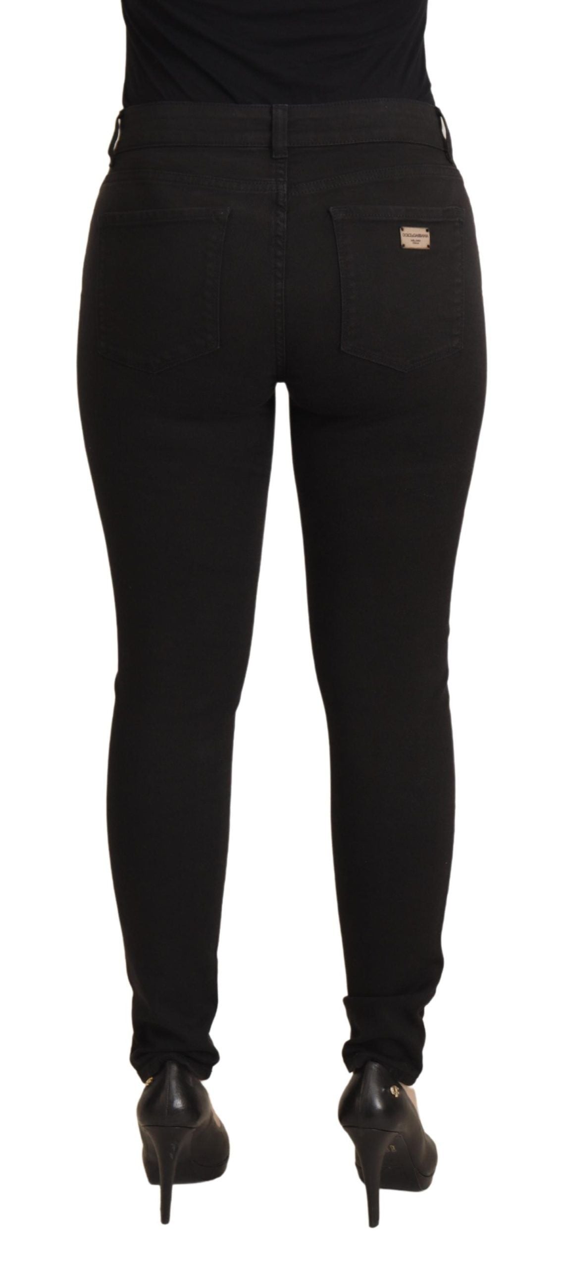 Jeans skinny elasticizzati in cotone nero lucido