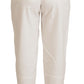 Eleganti pantaloni bianchi a vita alta affusolati