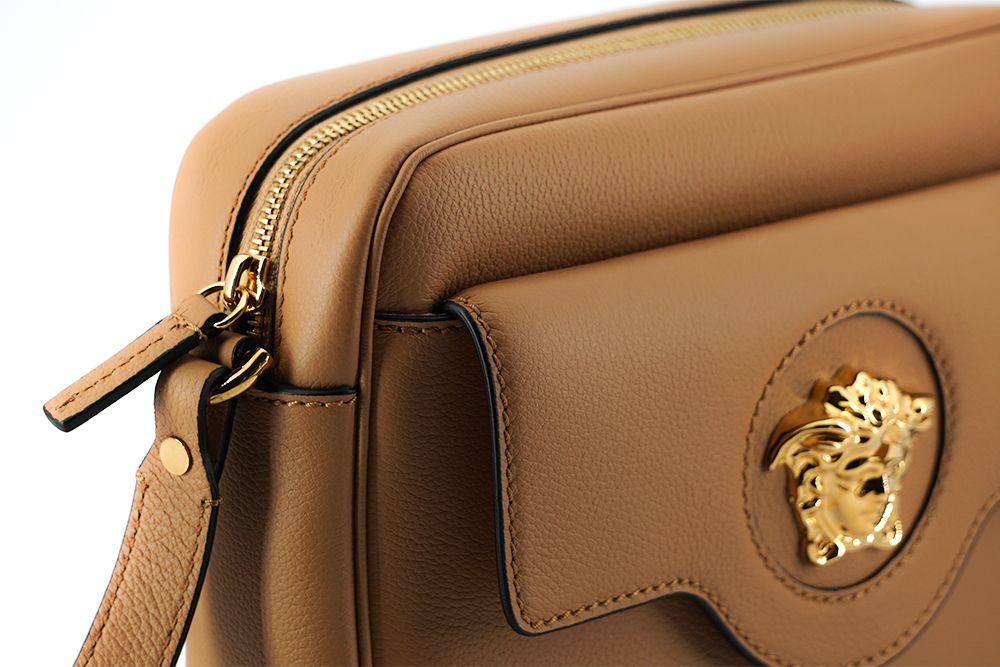 Elegante borsa a tracolla in pelle marrone per macchina fotografica