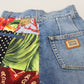 Jeans di lusso in denim blu jacquard patchwork