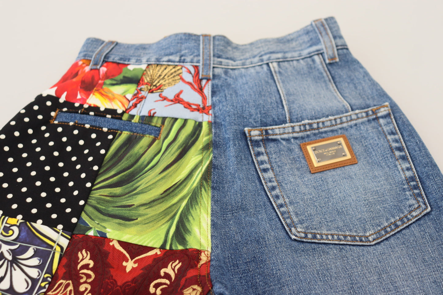 Jeans di lusso in denim blu jacquard patchwork