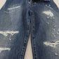 Eleganti jeans strappati
