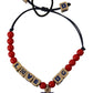 Elegante bracciale in vetro blu, rosso e zama