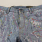 Exquisite Jeanshose mit Farbspritzern