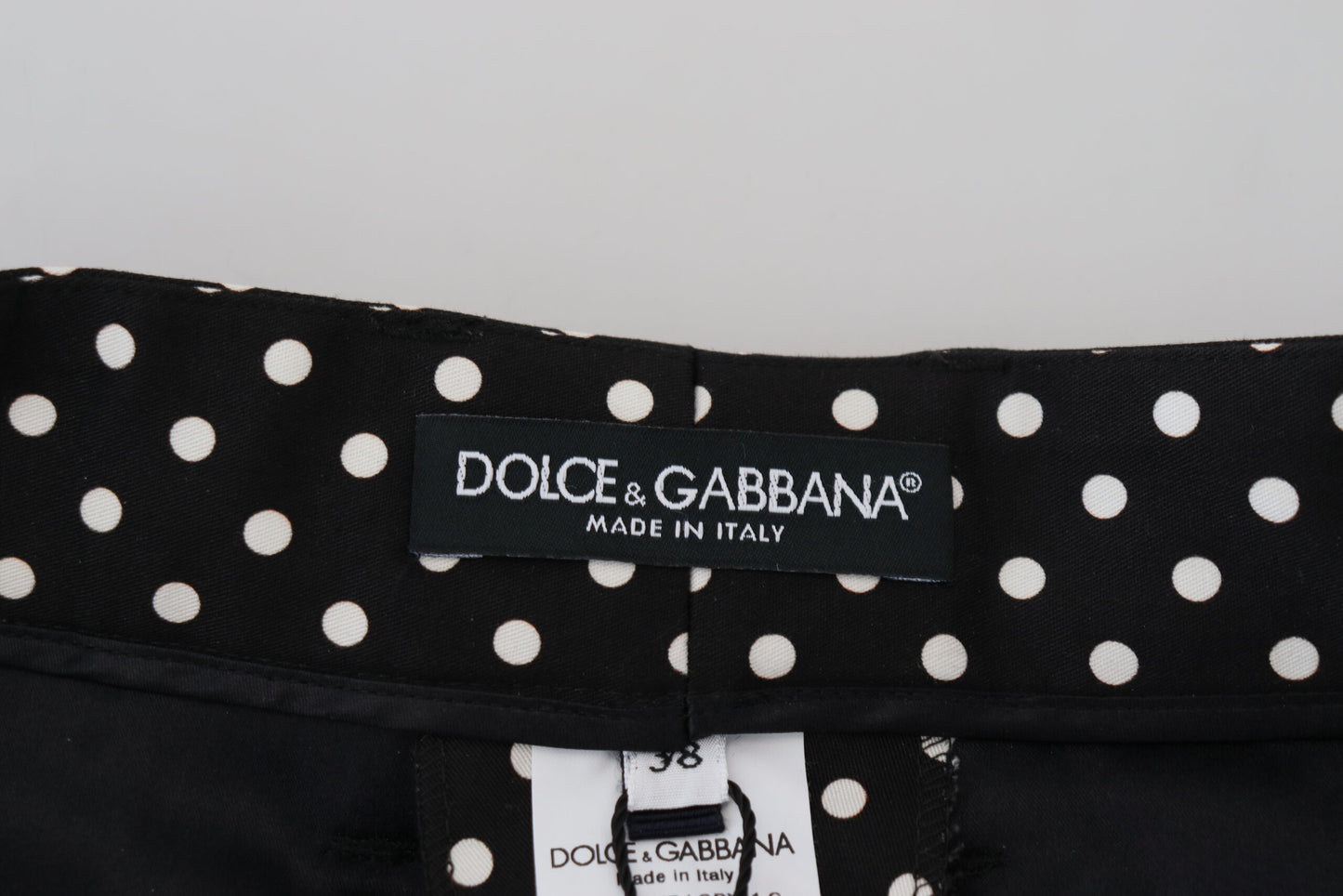 Pantaloni eleganti a pois a vita alta