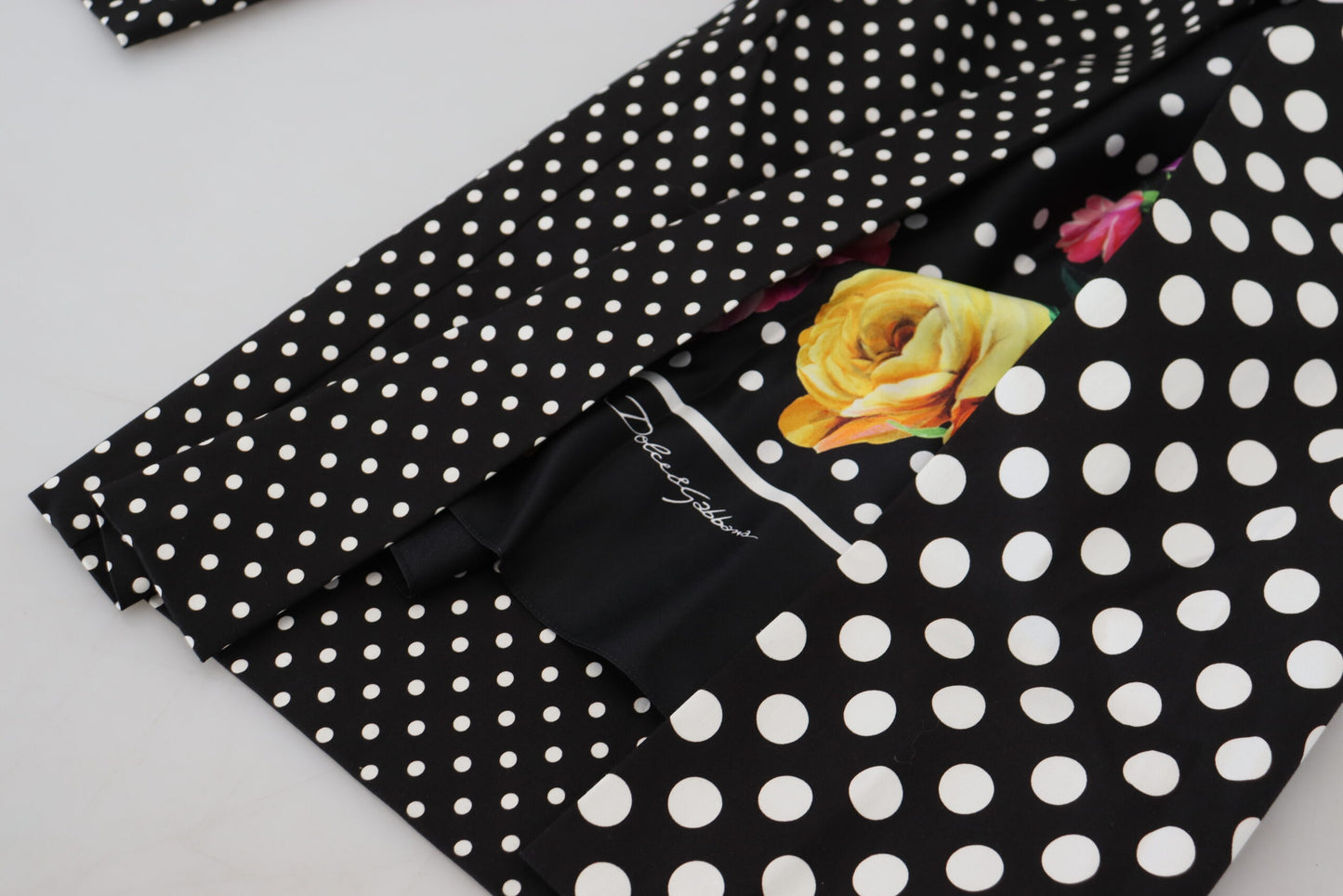 Pantaloni eleganti a pois a vita alta