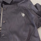 Elegante polo a maniche lunghe grigia