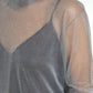 Elegante maglia a maniche lunghe grigia in rete