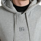 Schicker grauer Baumwollpullover mit Logo und Kapuze