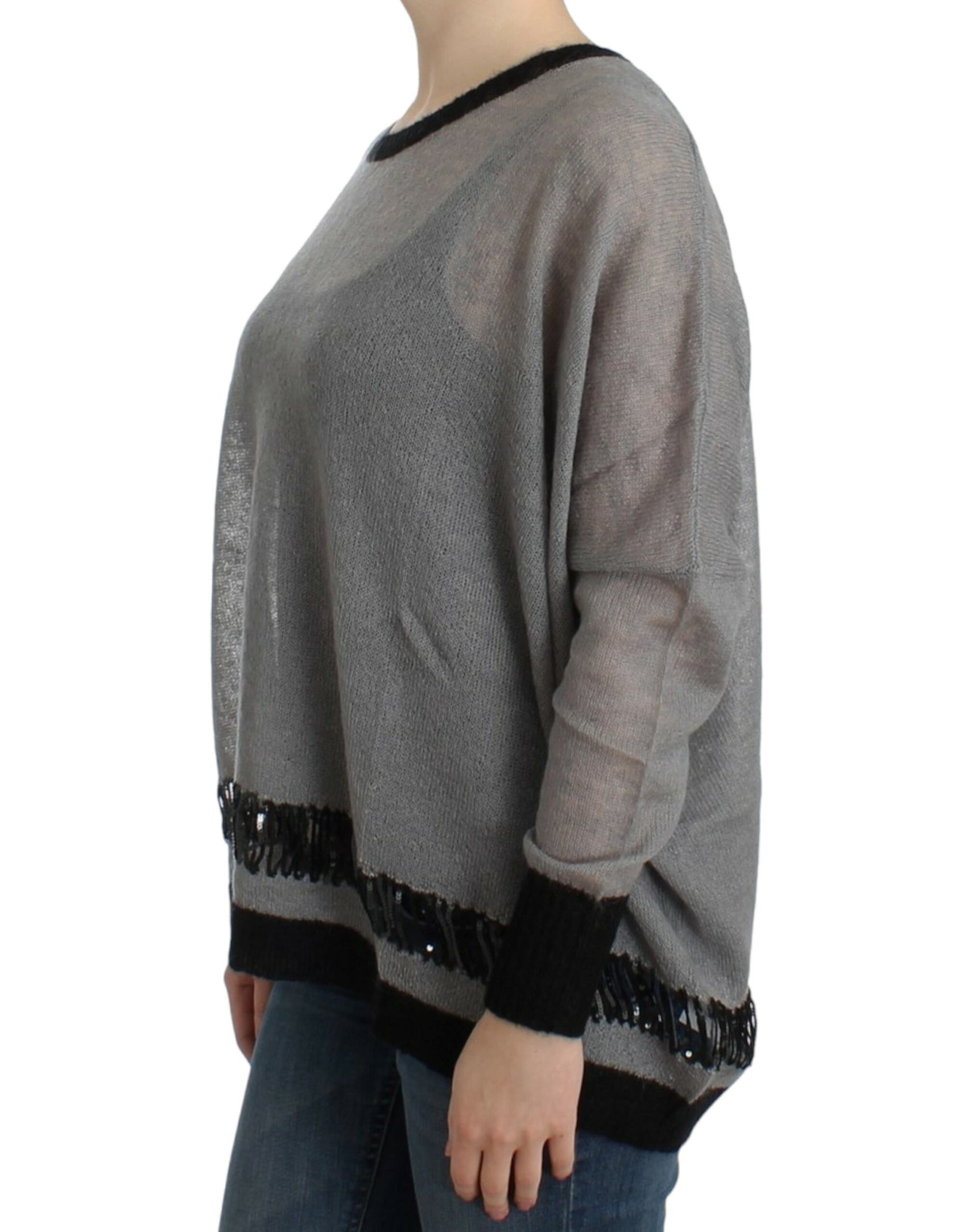 Schicker asymmetrischer Strickpullover mit Verzierung
