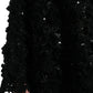 Maglione nero decorato con paillettes