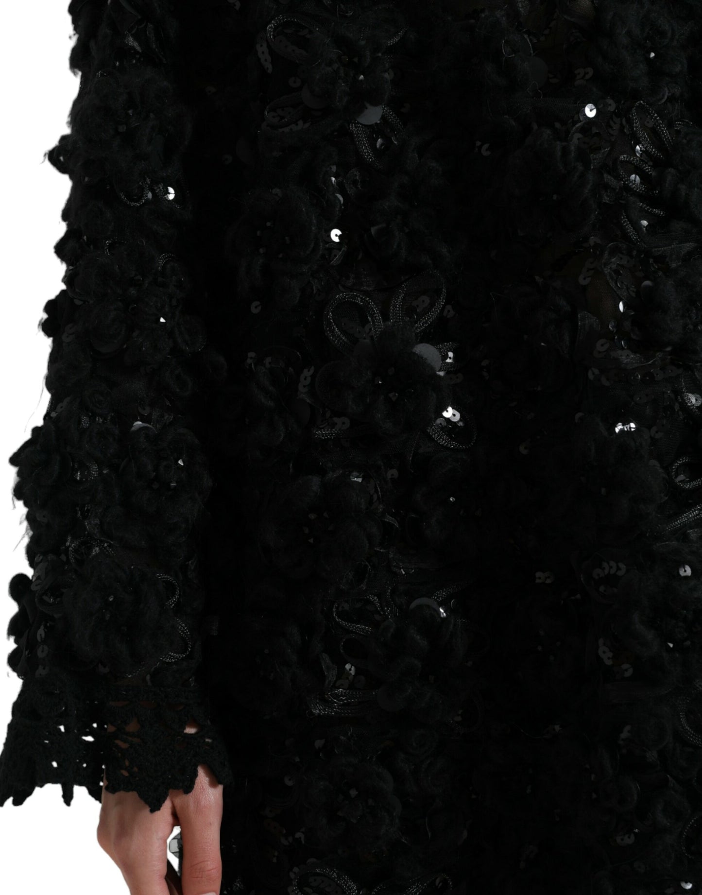 Maglione nero decorato con paillettes