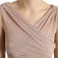 Elegante canotta senza maniche con scollo a V beige trasparente