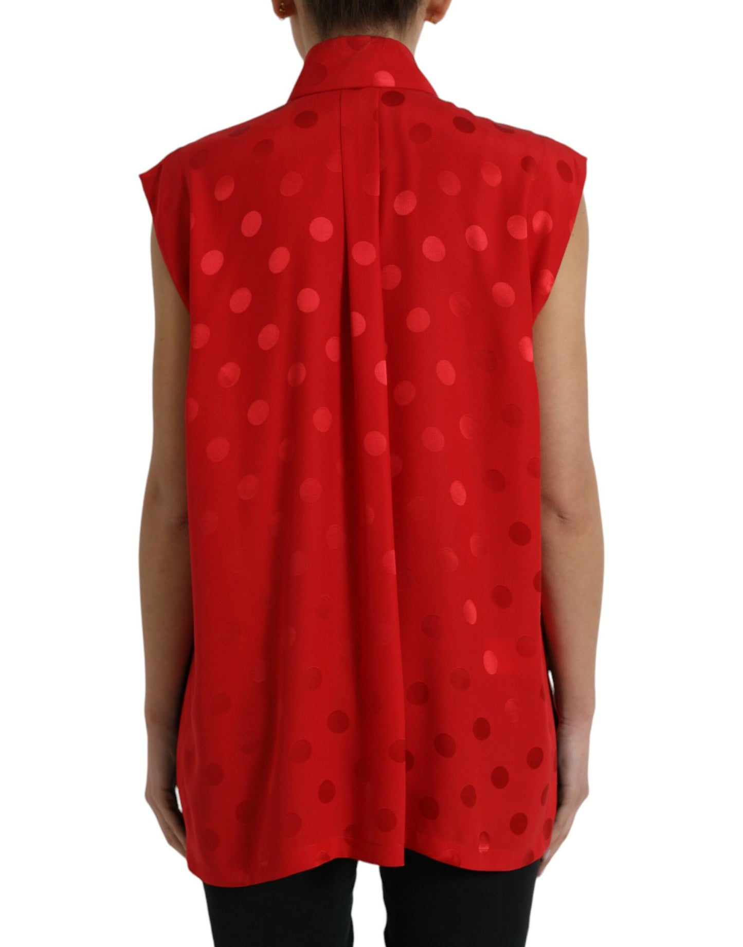 Elegante camicetta senza maniche in seta a pois