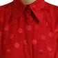 Elegante camicetta senza maniche in seta a pois