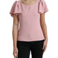 Top elegante rosa con maniche a campana