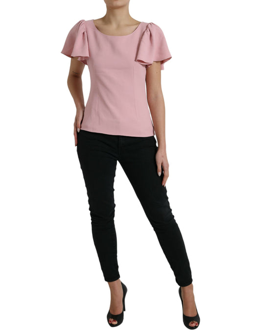 Top elegante rosa con maniche a campana