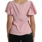 Top elegante rosa con maniche a campana