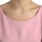 Top elegante rosa con maniche a campana