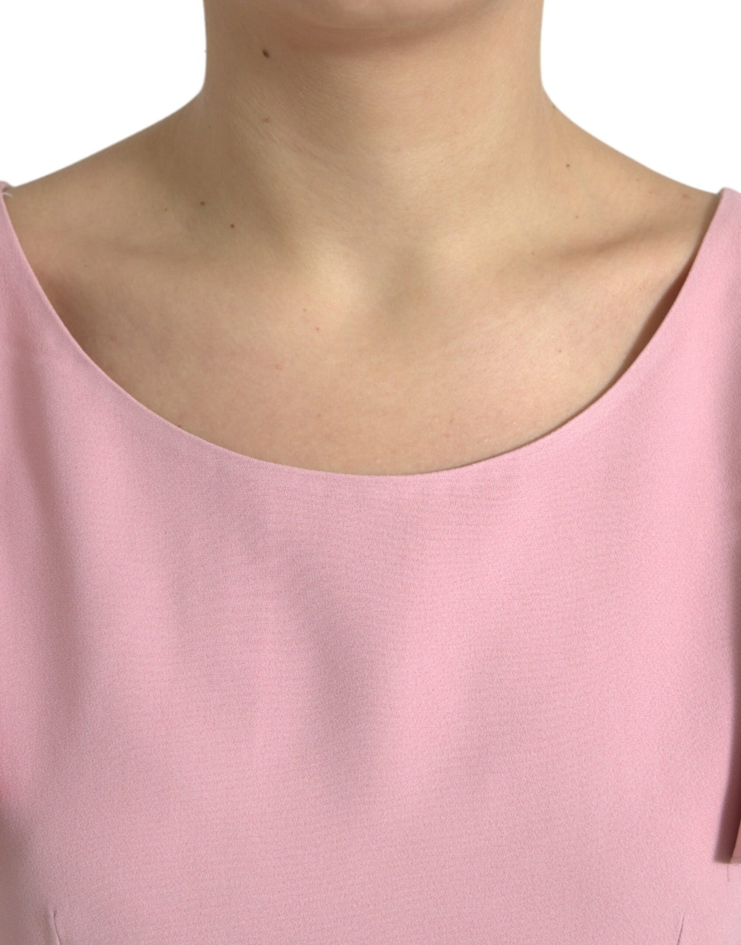 Top elegante rosa con maniche a campana