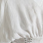 Elegante corsetto bianco con lacci e top corto