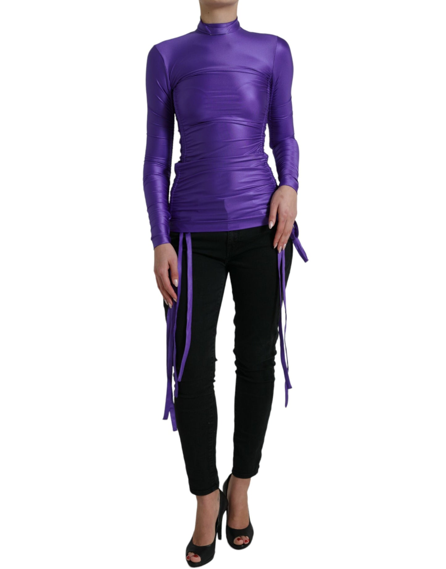 Elegante top a maniche lunghe con cerniera posteriore