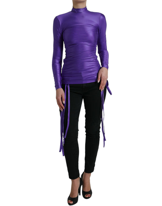 Elegante top a maniche lunghe con cerniera posteriore