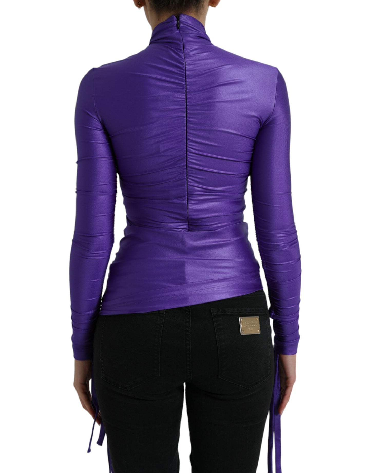 Elegante top a maniche lunghe con cerniera posteriore