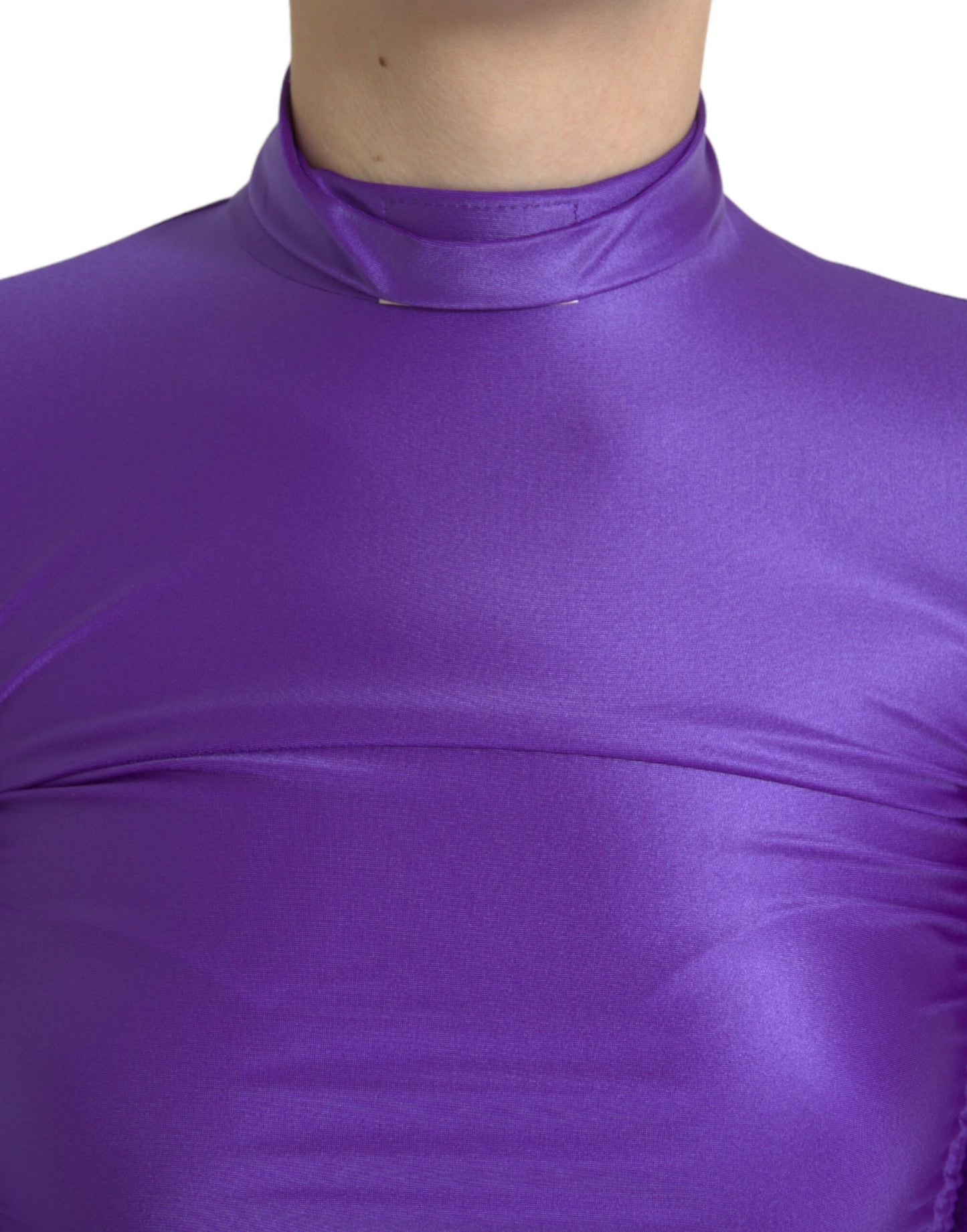 Elegante top a maniche lunghe con cerniera posteriore